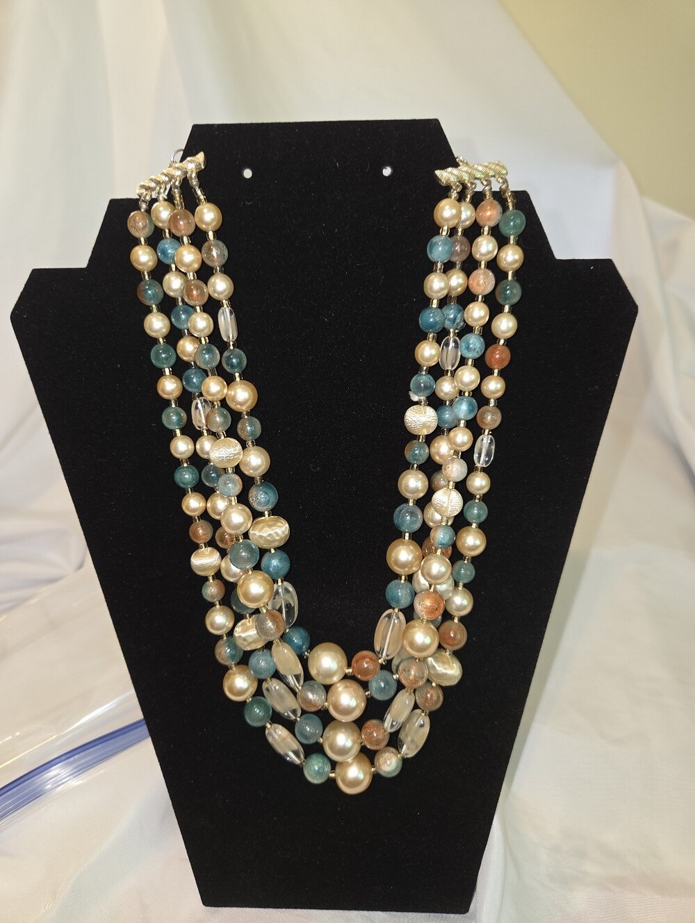 Multi-Strand Pearl Tone & Bead Statement Necklace in Teal, Gold, and Peach